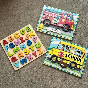 Three wooden puzzles in like new condition